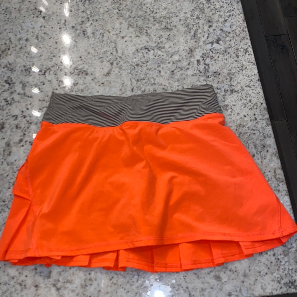 pinkish orange ish lululemon skit